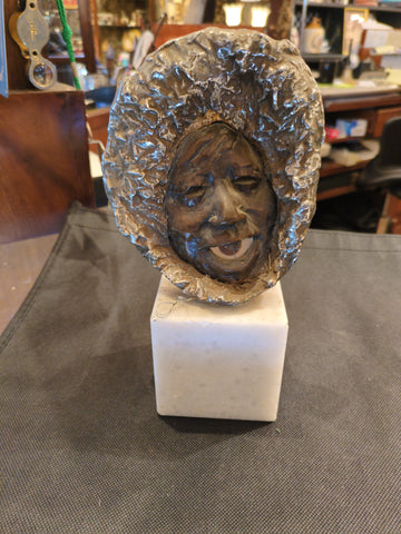 Face Bronze on Marble